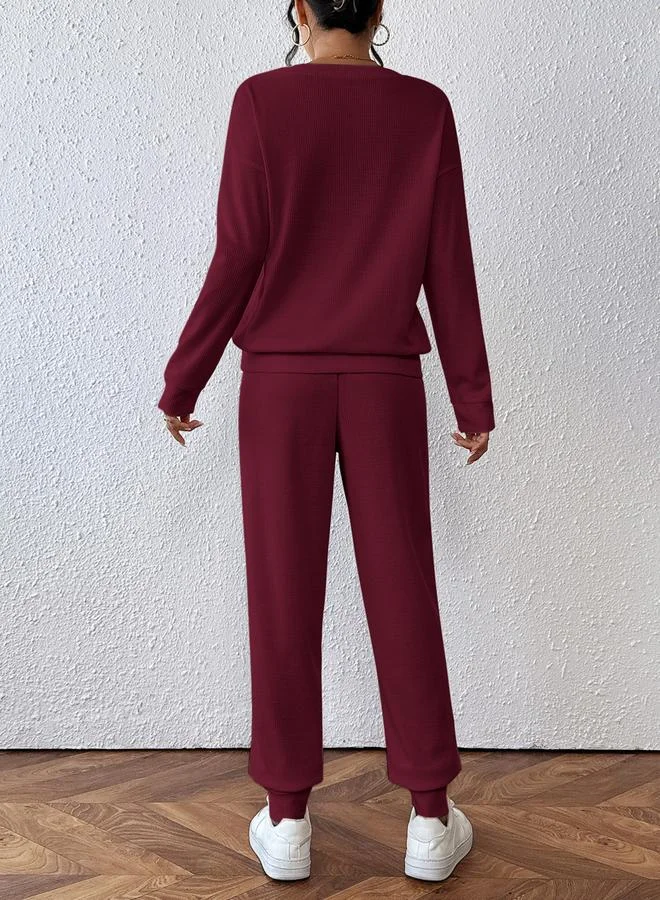 تايك تو طقم بلوزة بملمس بارز وبنطال ماروني للنساء